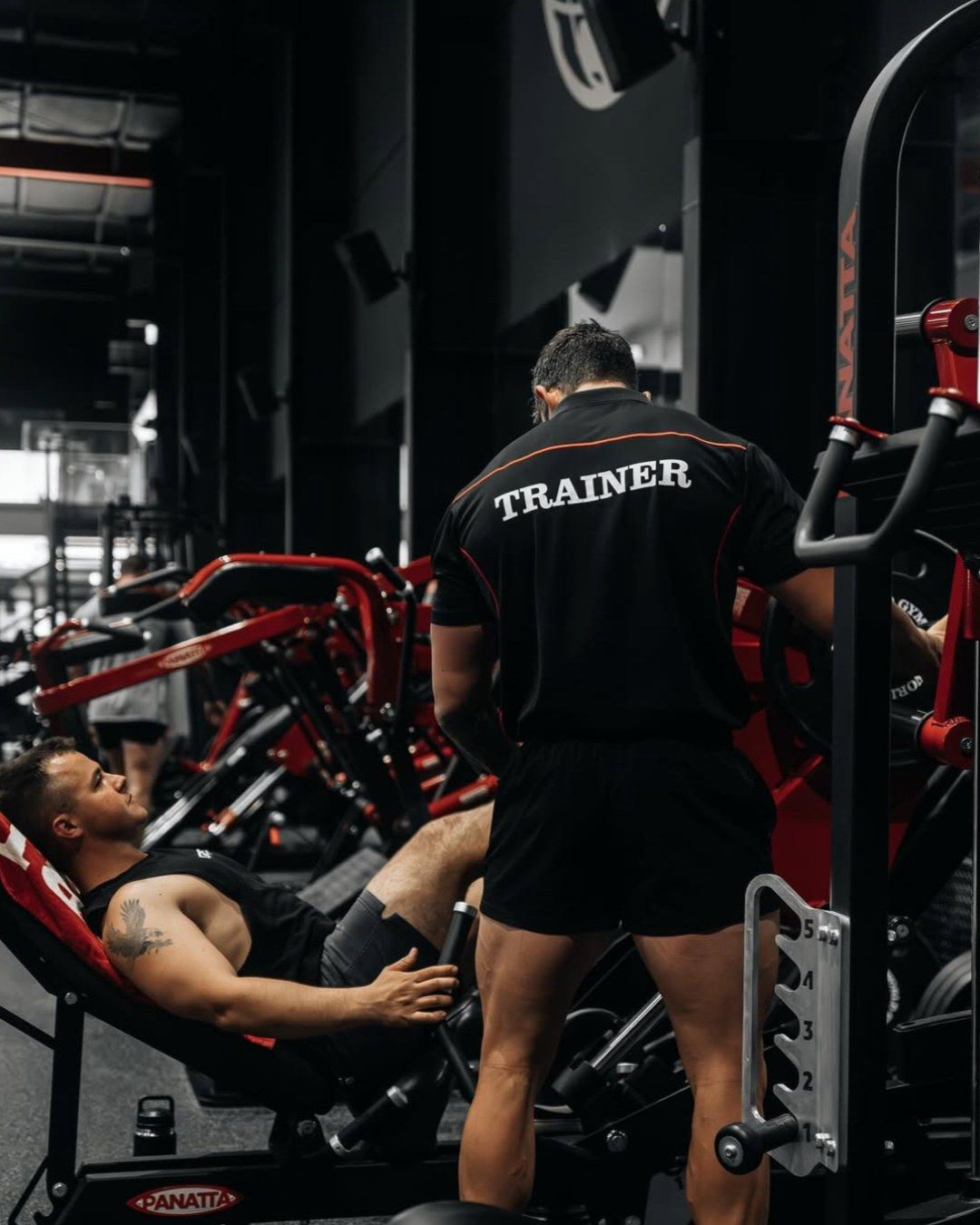 Consultant reviewing a gym's floor plan